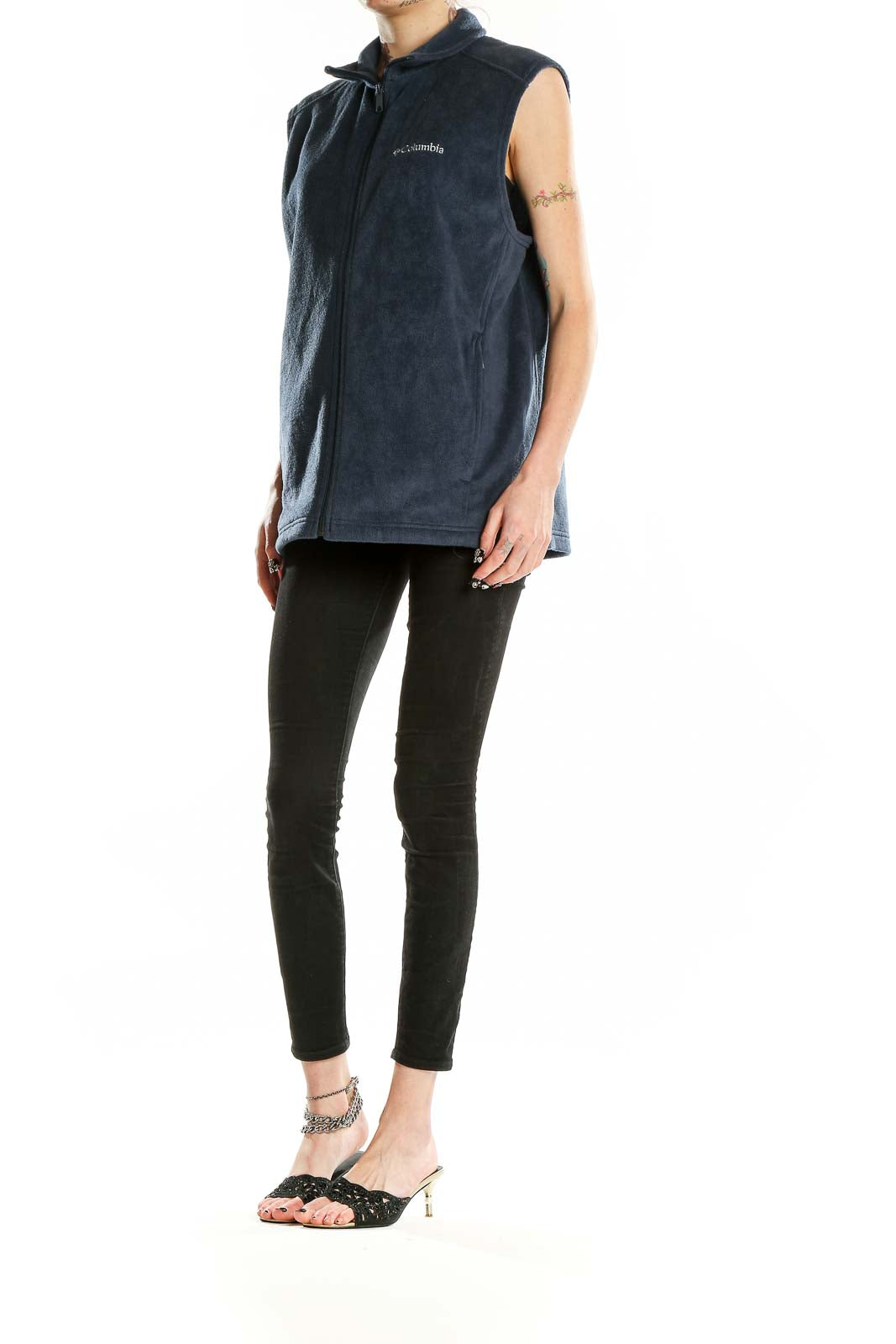 Front view of navy Columbia fleece vest with full zip closure