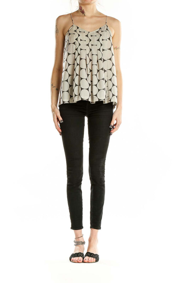 Front view of Madewell beige camisole top with large black polka dots