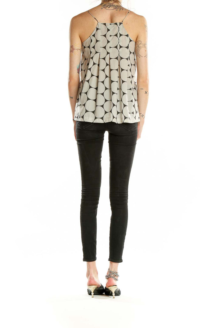 Back view of Madewell beige camisole top with large black polka dots