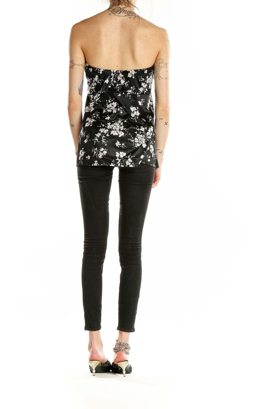 Back view of Torrid black strapless top with white floral print