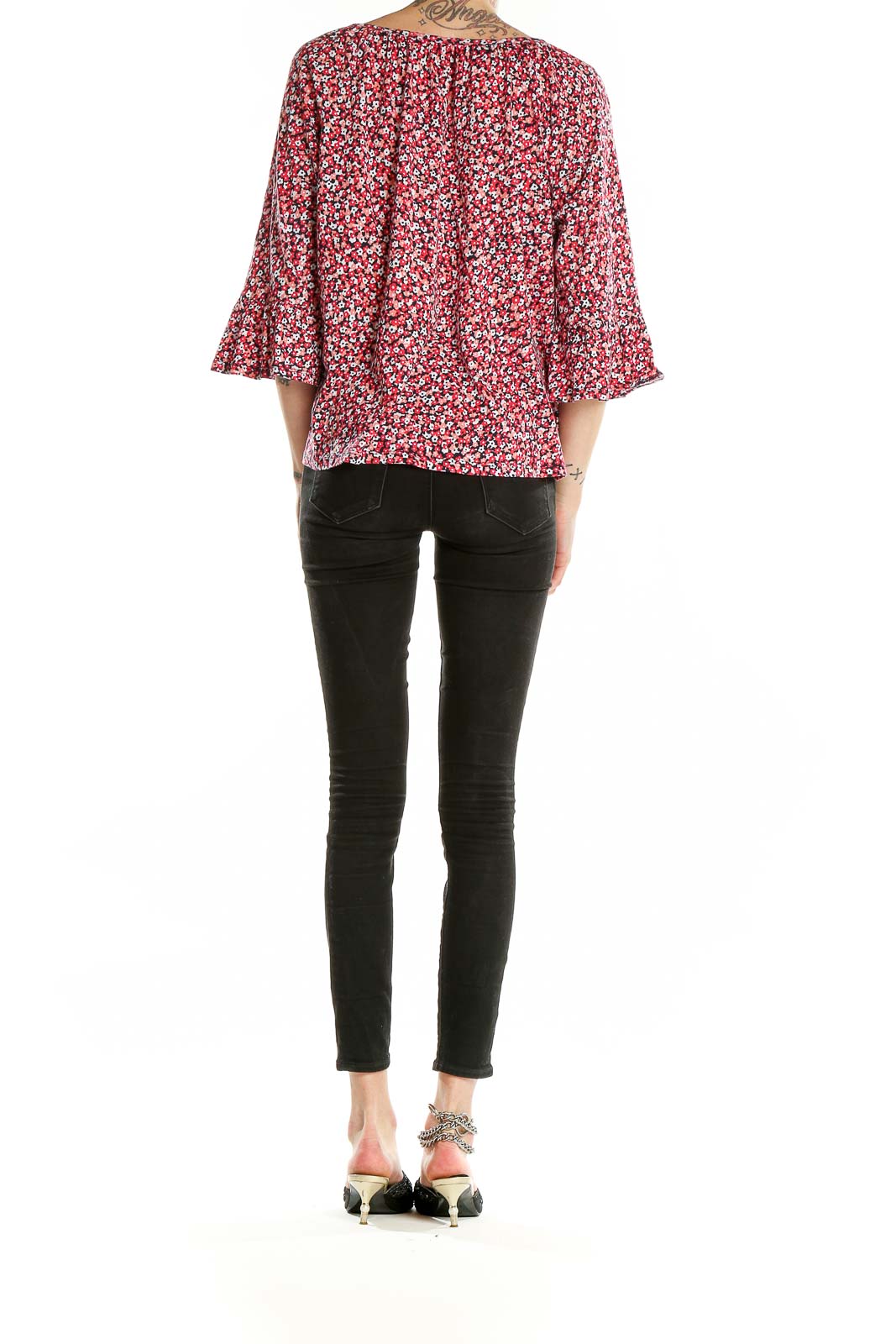 Back view of MICHAEL Michael Kors red floral print blouse showing bell sleeves and relaxed fit