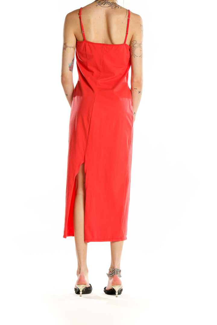 Back view of red Shape Fx midi dress showing back slit