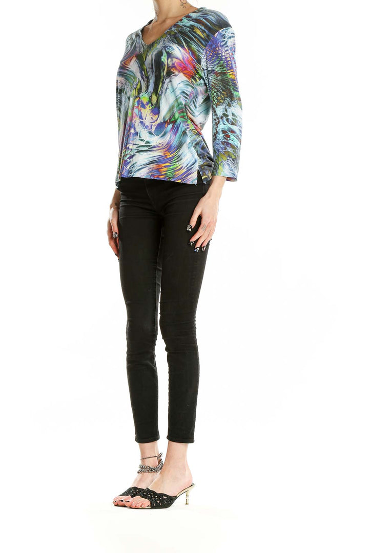 Front view of Linda Leal multicolor abstract print V-neck top