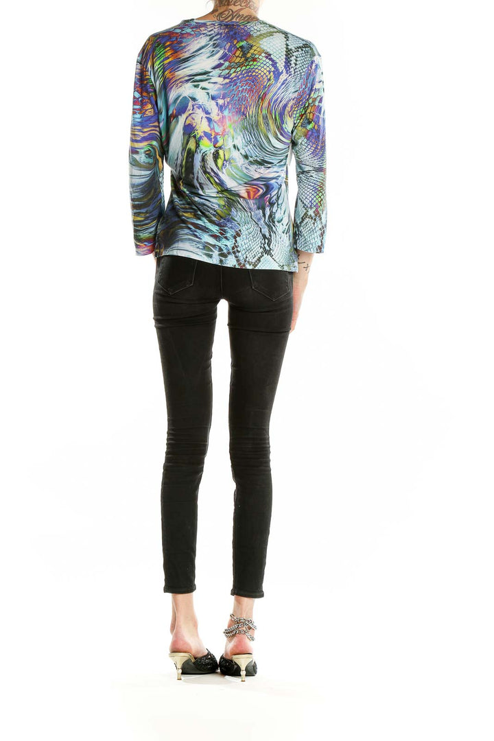 Back view of Linda Leal multicolor abstract print top with 3/4 sleeves