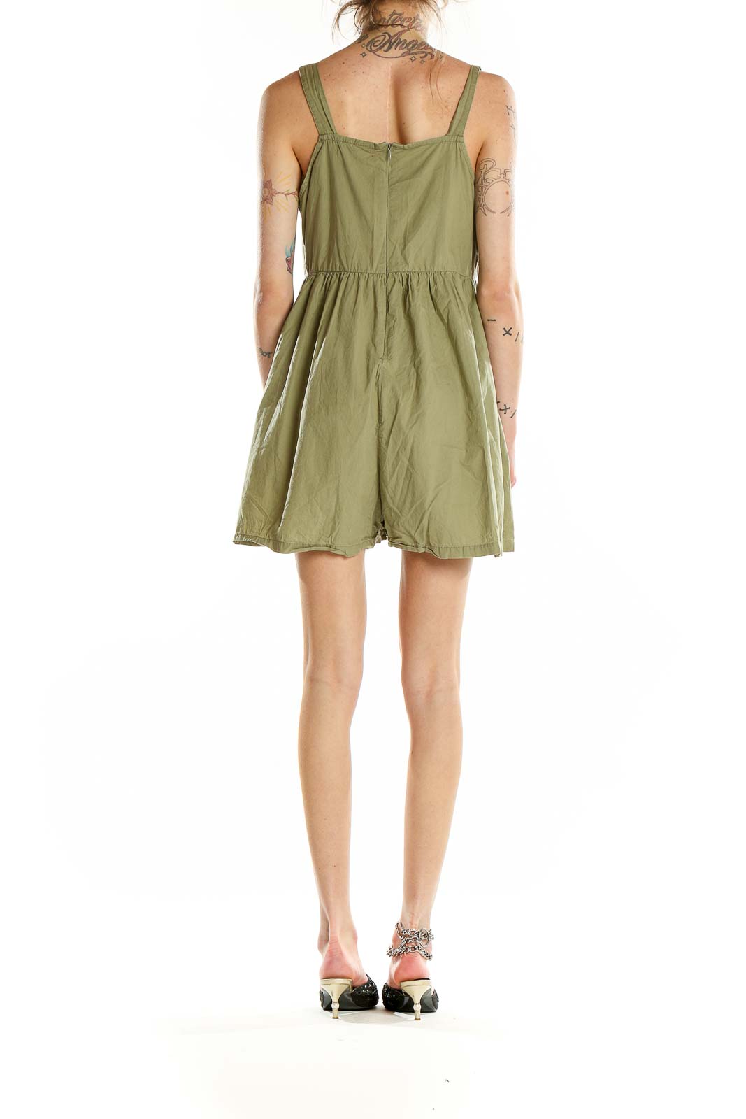 Back view of olive green cotton romper showing wide straps and gathered waist