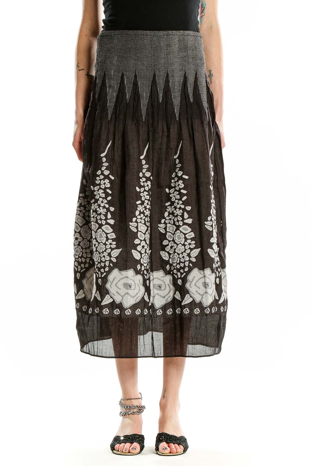 Front view of Lapis black midi skirt with white floral print