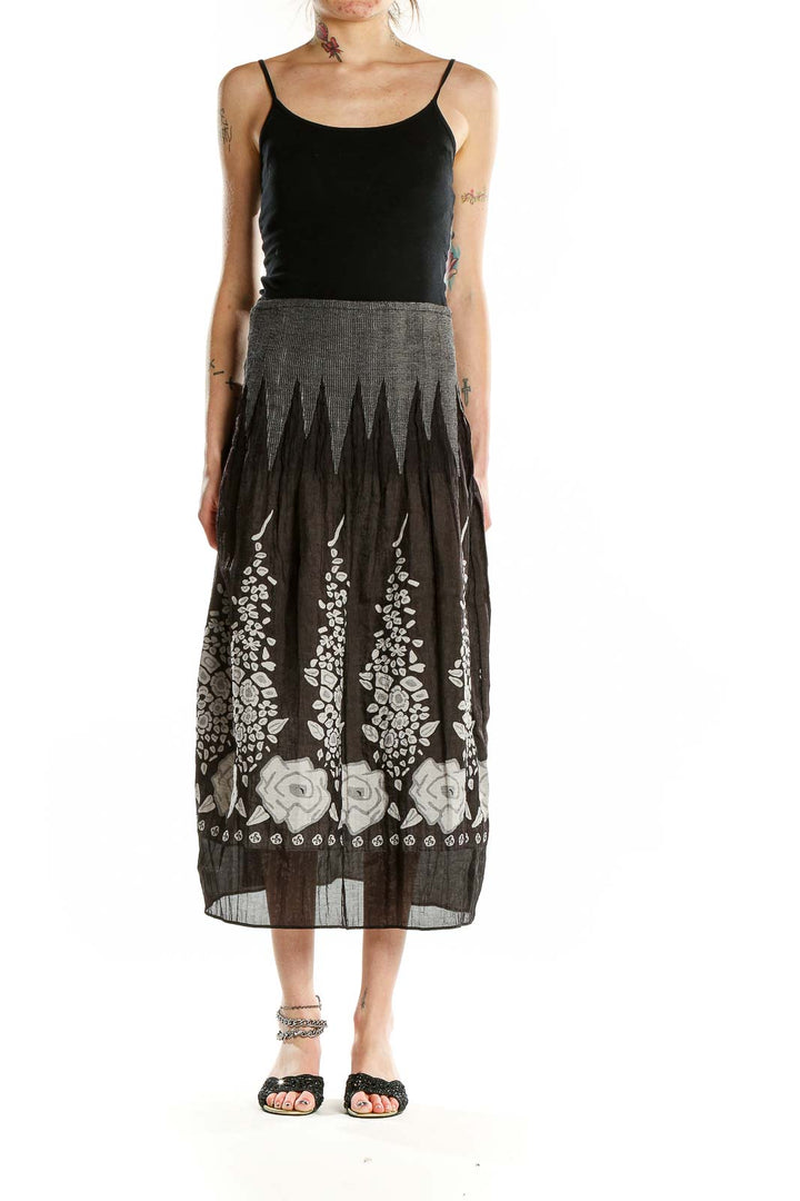 Front view of Lapis black midi skirt with white floral print