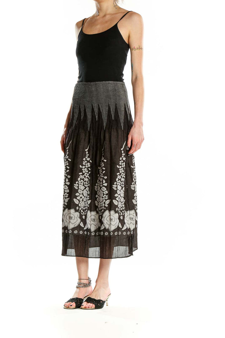Front view of Lapis black midi skirt with white floral print