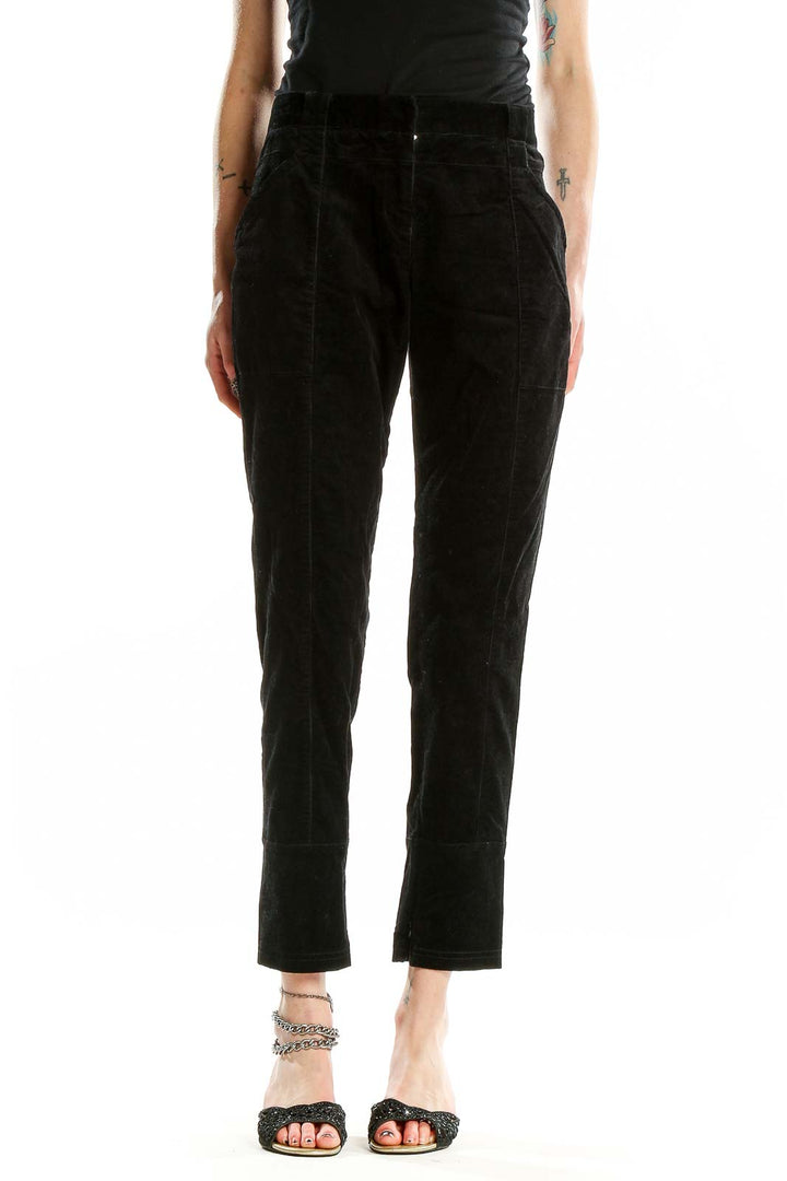 Front view of Proenza Schouler black tailored trousers with side pockets