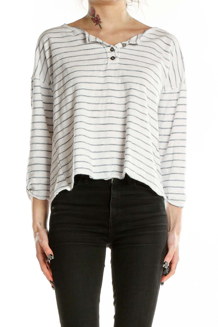 Front view of Hem & Thread white striped relaxed fit top with V-neckline