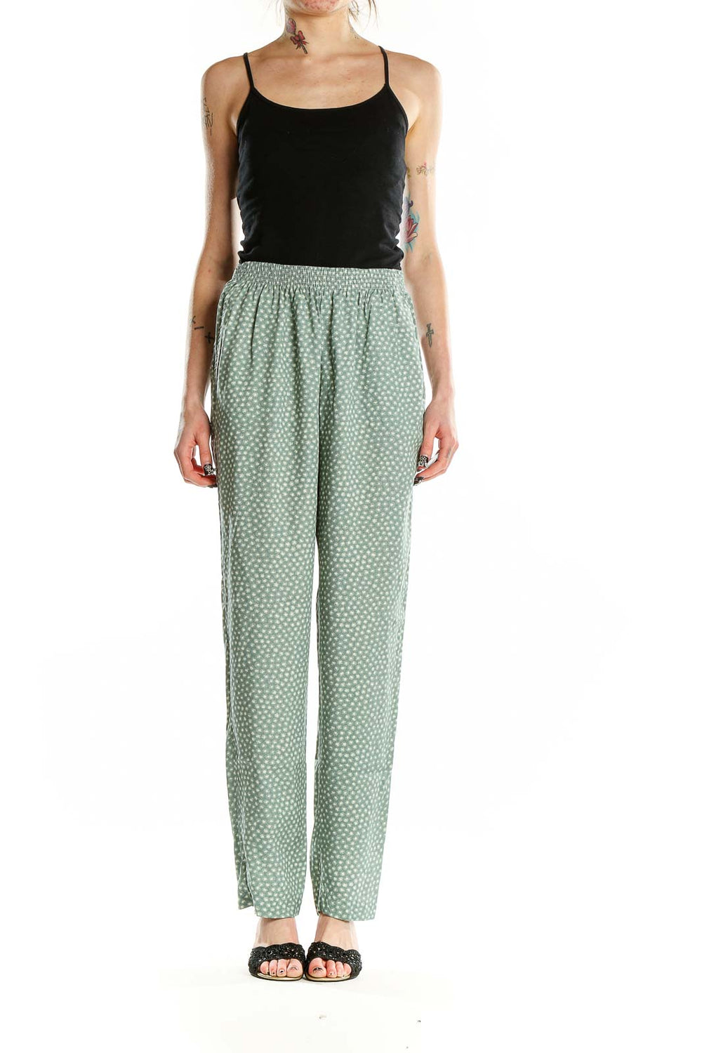 Front view of sage green polka dot rayon pants by Jeni Marque