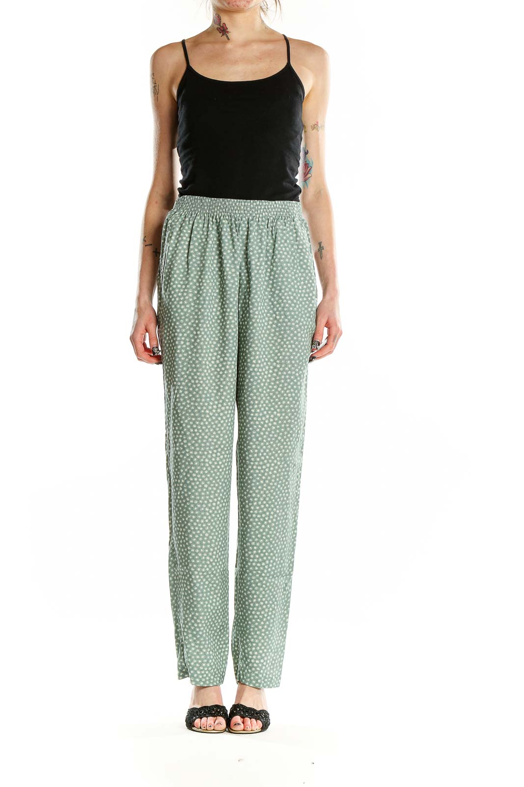 Front view of sage green polka dot rayon pants by Jeni Marque