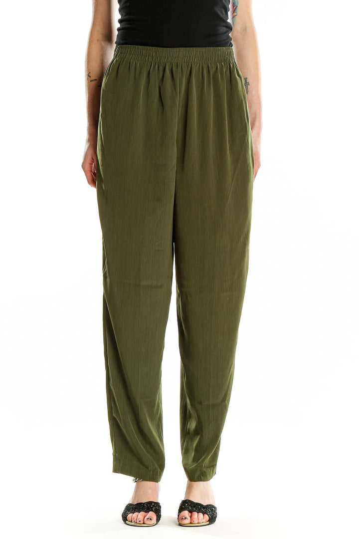 Front view of olive green relaxed fit polyester pants by David Benjamin