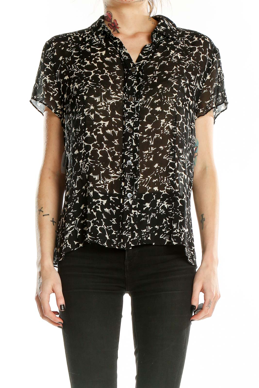 Front view of Ann Taylor black silk blouse with white floral print