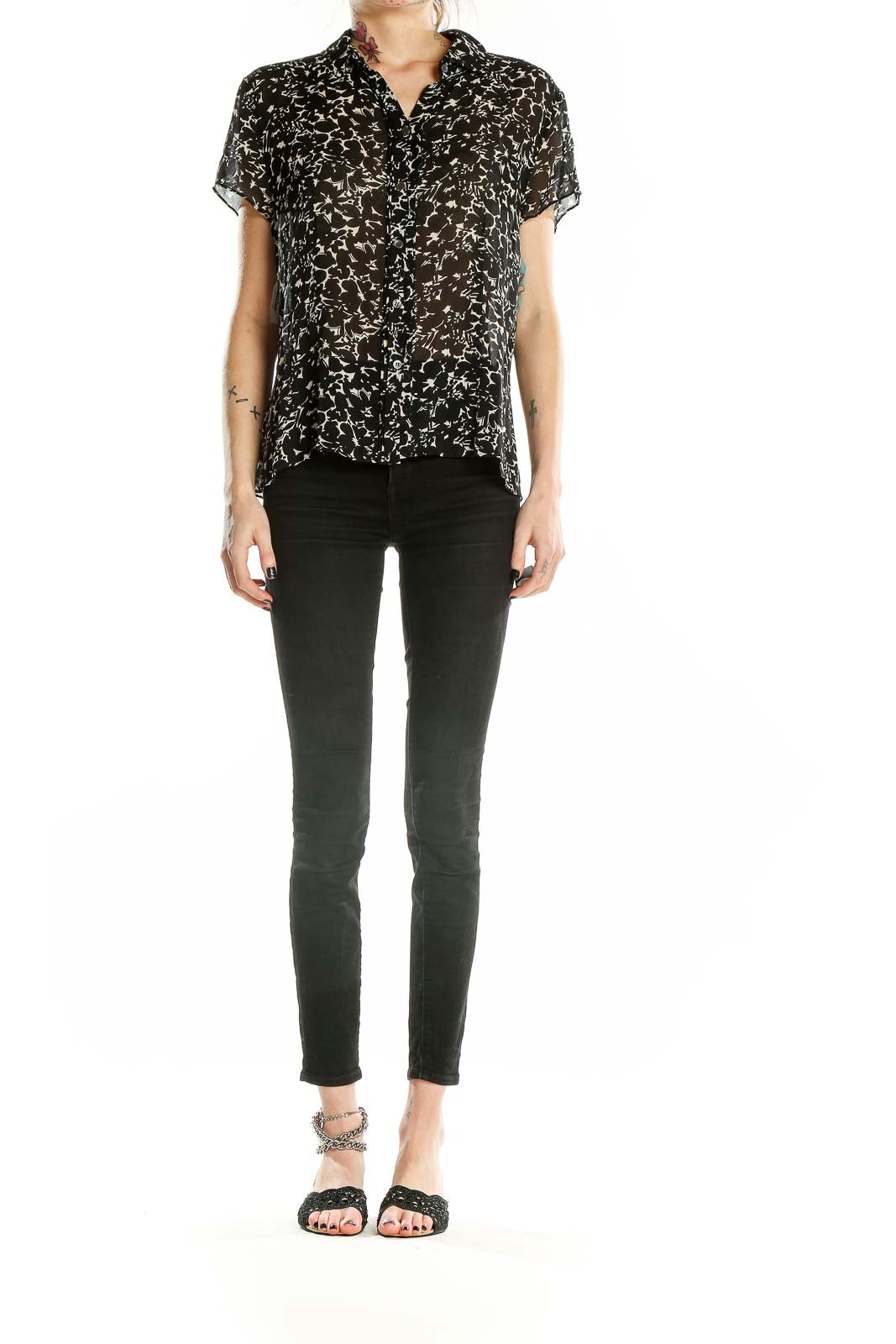 Front view of Ann Taylor black silk blouse with white floral print