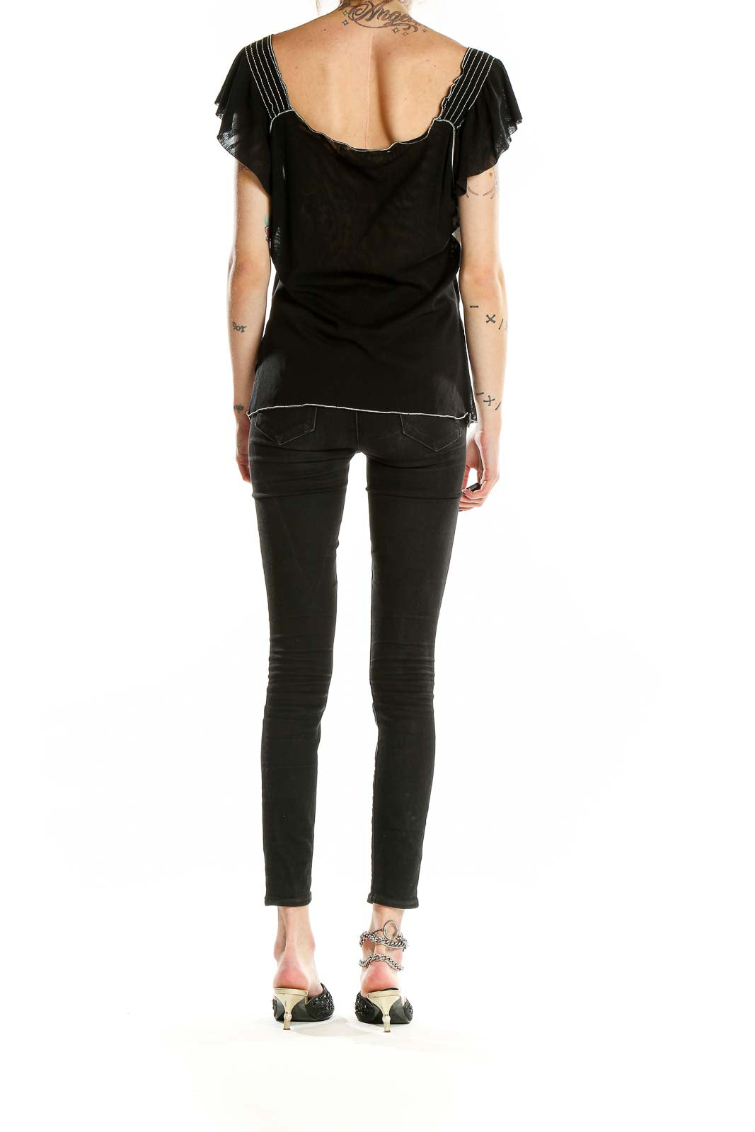 Back view of black Max Studio V-neck top showing flutter sleeves and fit