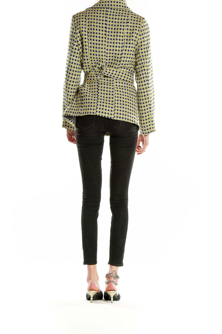 Back view of Robert Louis yellow geometric print peacoat showing belted waist