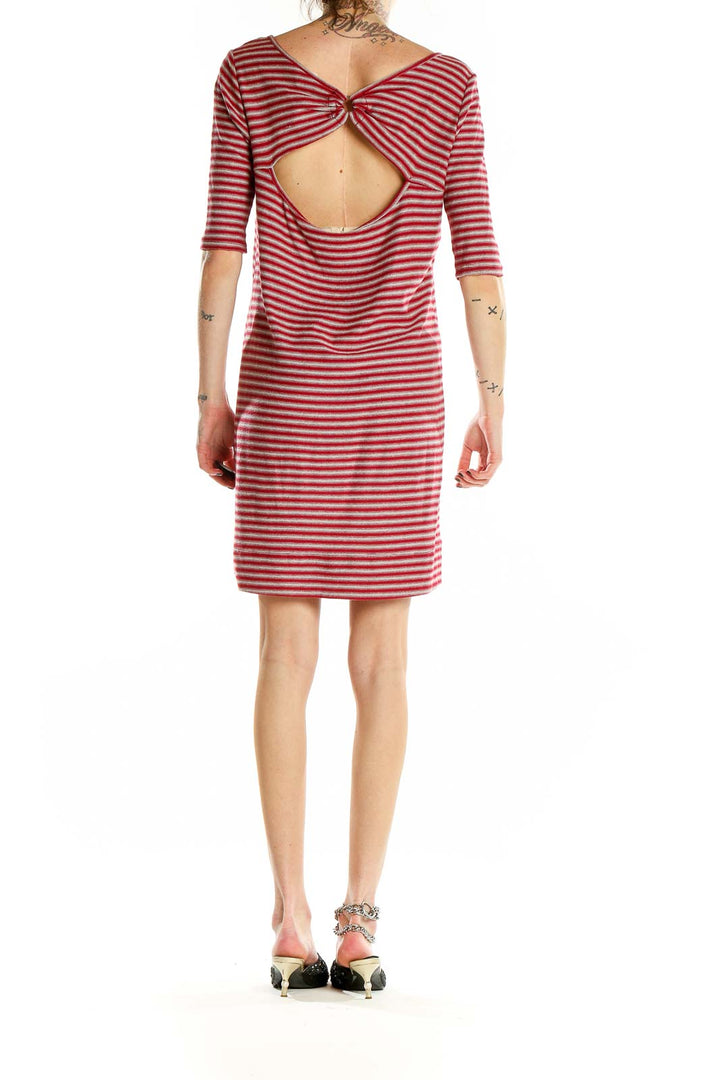 Back view of WE THE FREE red striped cotton t-shirt dress showing open back design