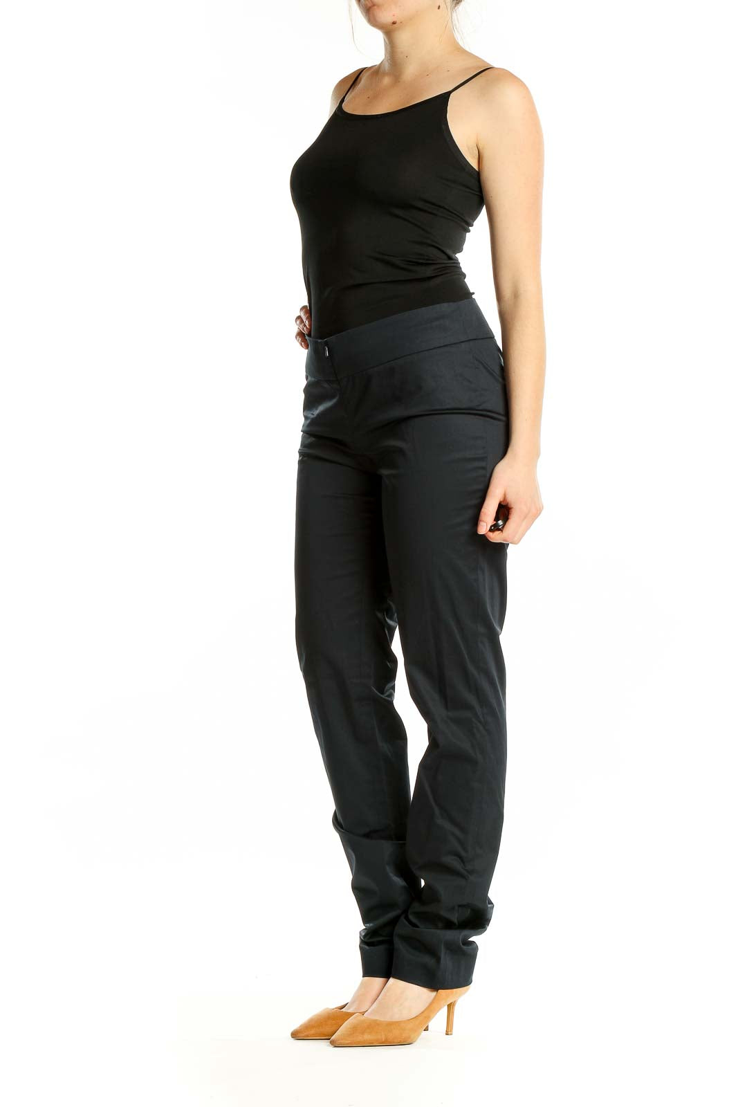Front view of black slim-fit Worth pants on model