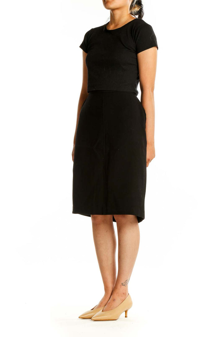 Front view of Anne Klein black pencil skirt with side slit