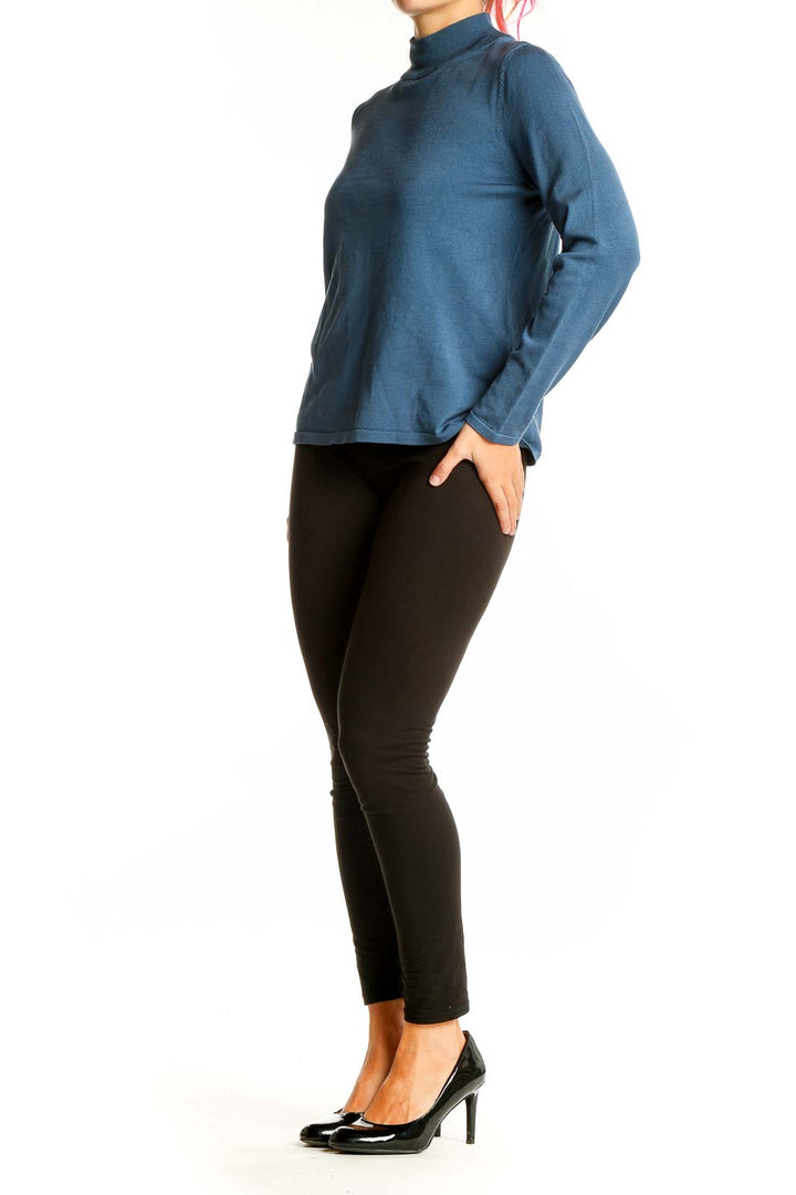 Front view of blue Pendleton mock neck sweater on model