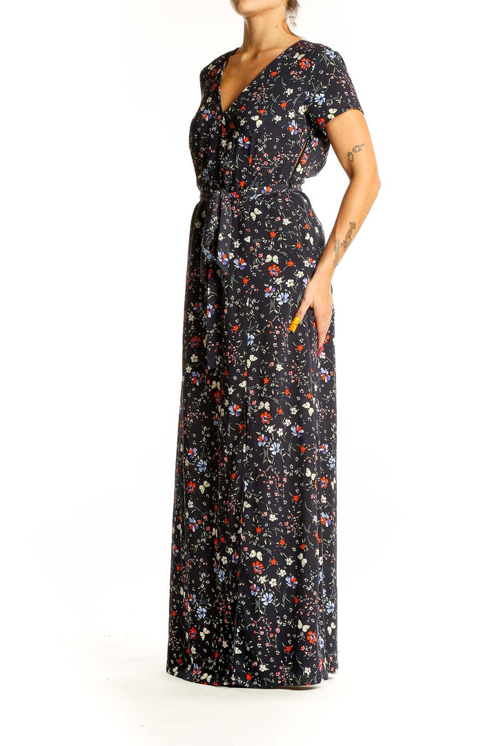 Front view of Sanctuary black floral print maxi dress with V-neck and wrap-style design