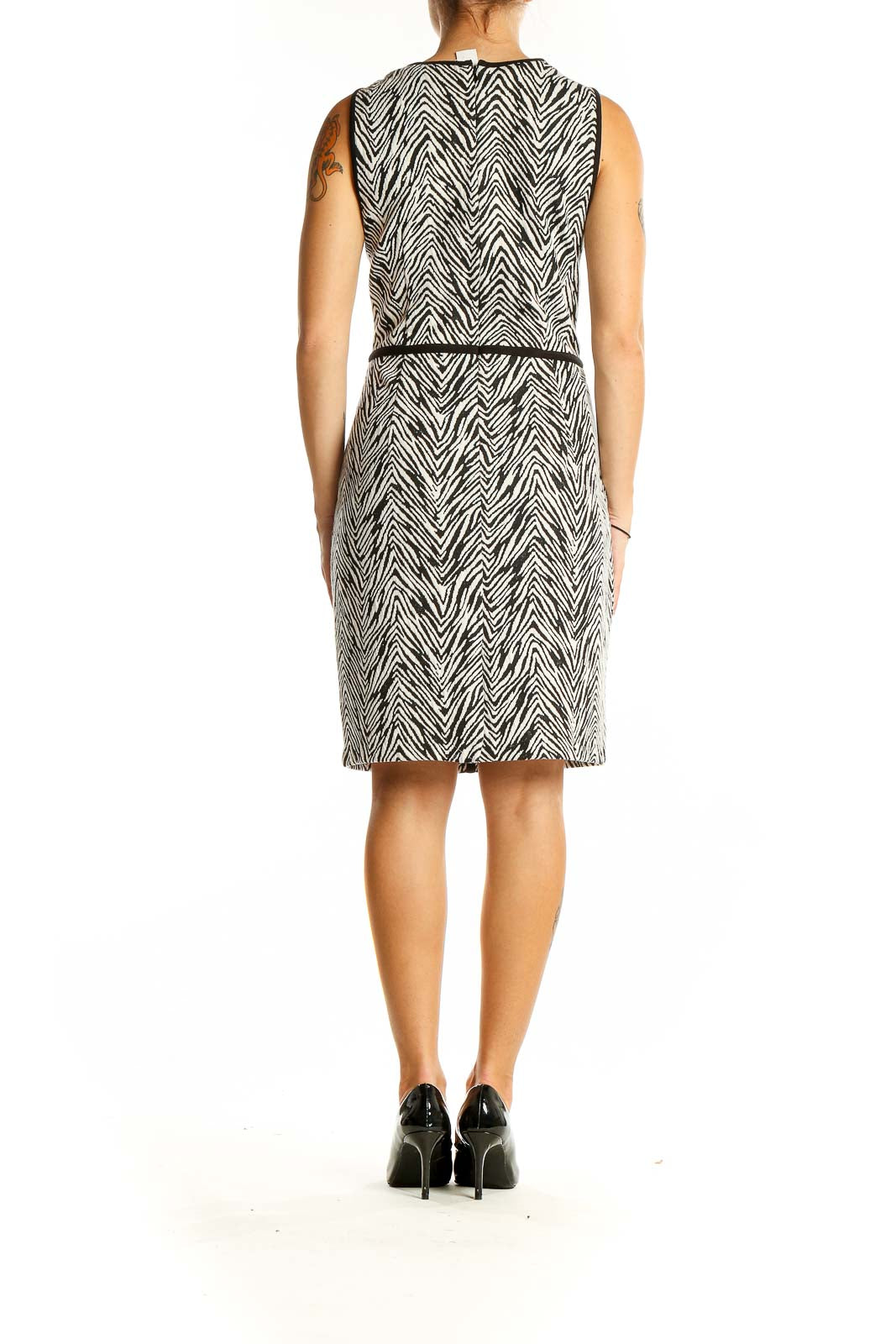 Back view of Ann Taylor black and white zebra print sheath dress showing full-length pattern