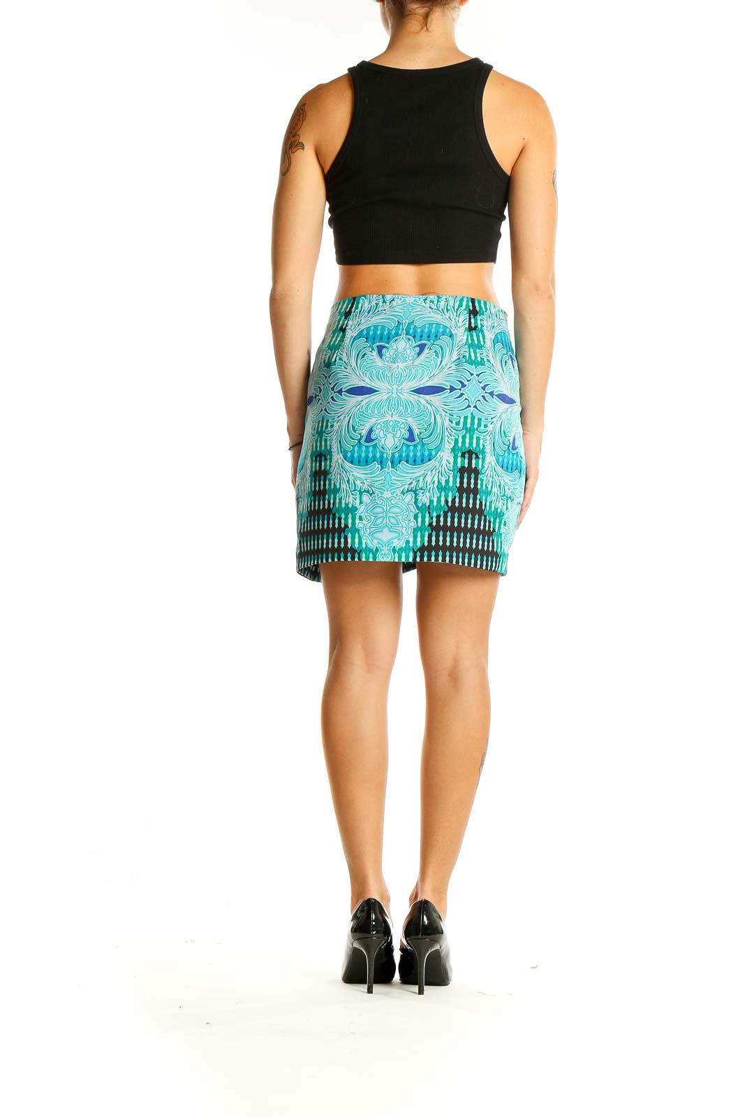 Back view of Bebe turquoise floral print wrap mini skirt