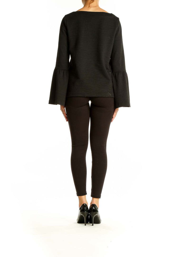 Back view of Ann Taylor Petites black bell sleeve top