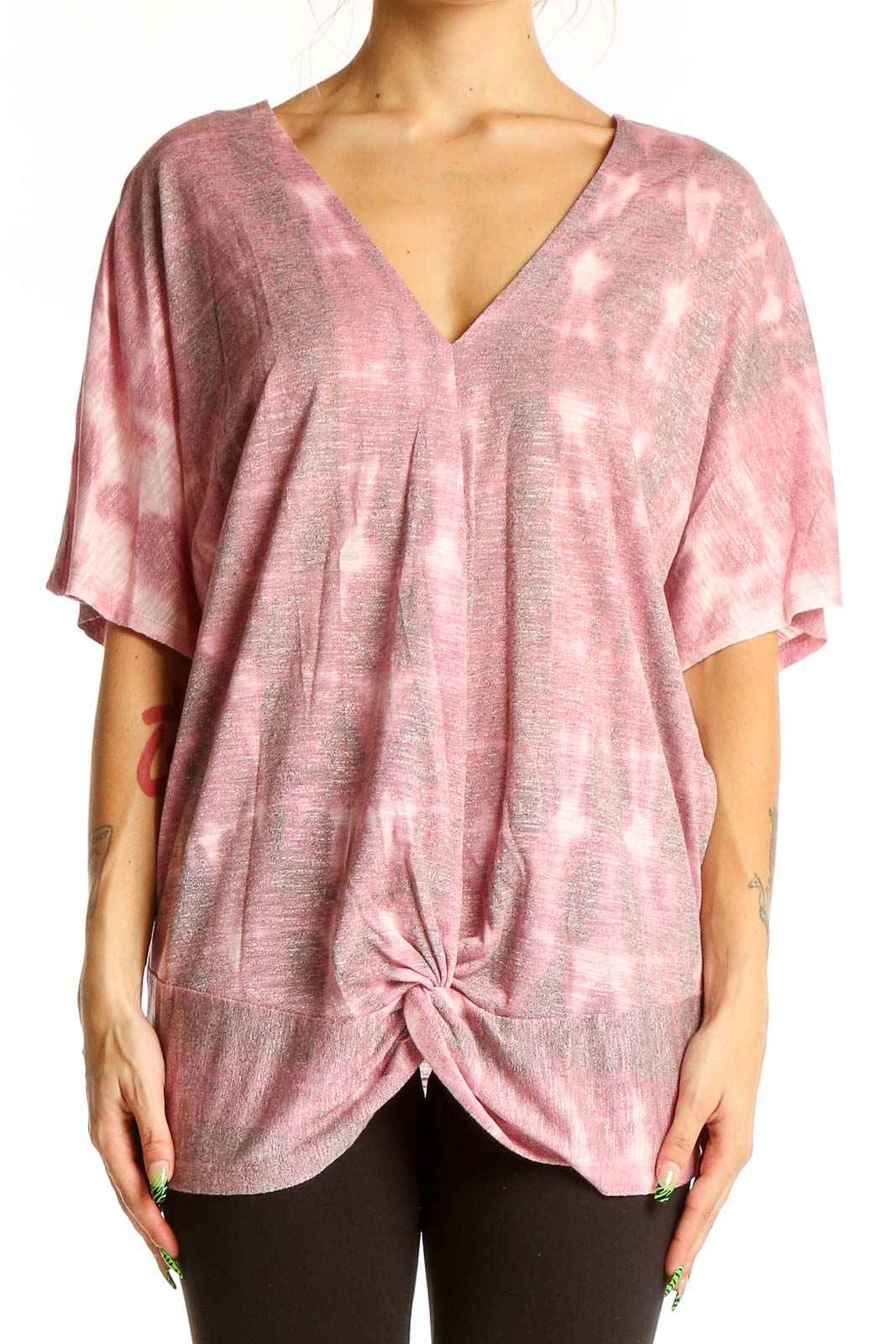 Front view of pink tie-dye V-neck oversized top with knotted hem