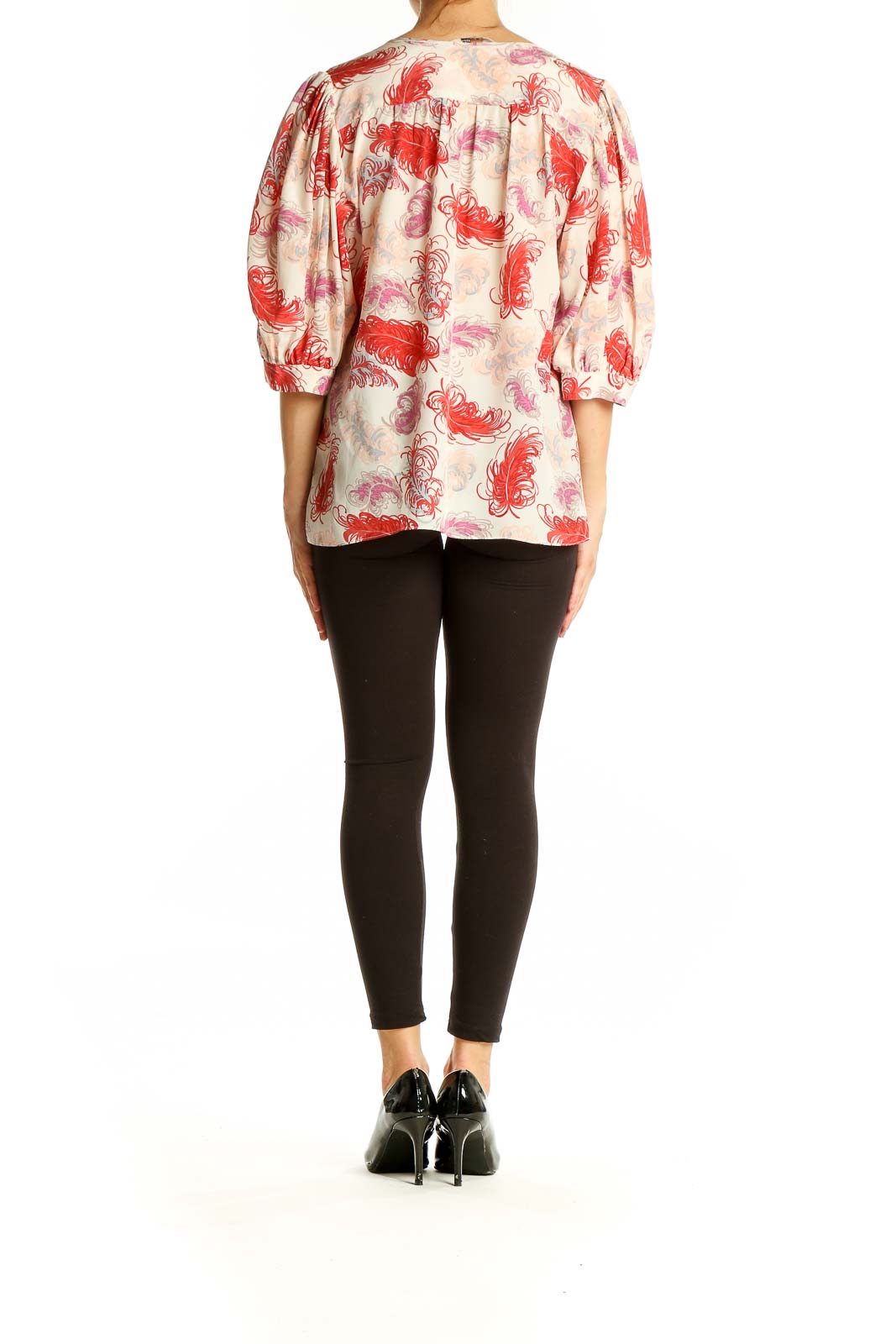 Back view of Tucker red feather print silk blouse showing relaxed fit