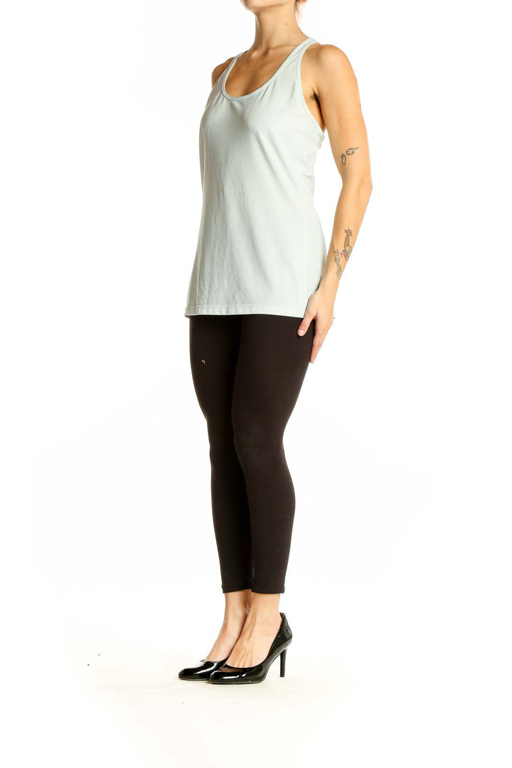 Front view of light gray Under Armour racerback athletic tank top