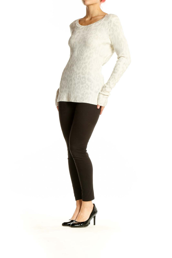 Front view of cream ribbed long sleeve sweater by Saks Fifth Avenue