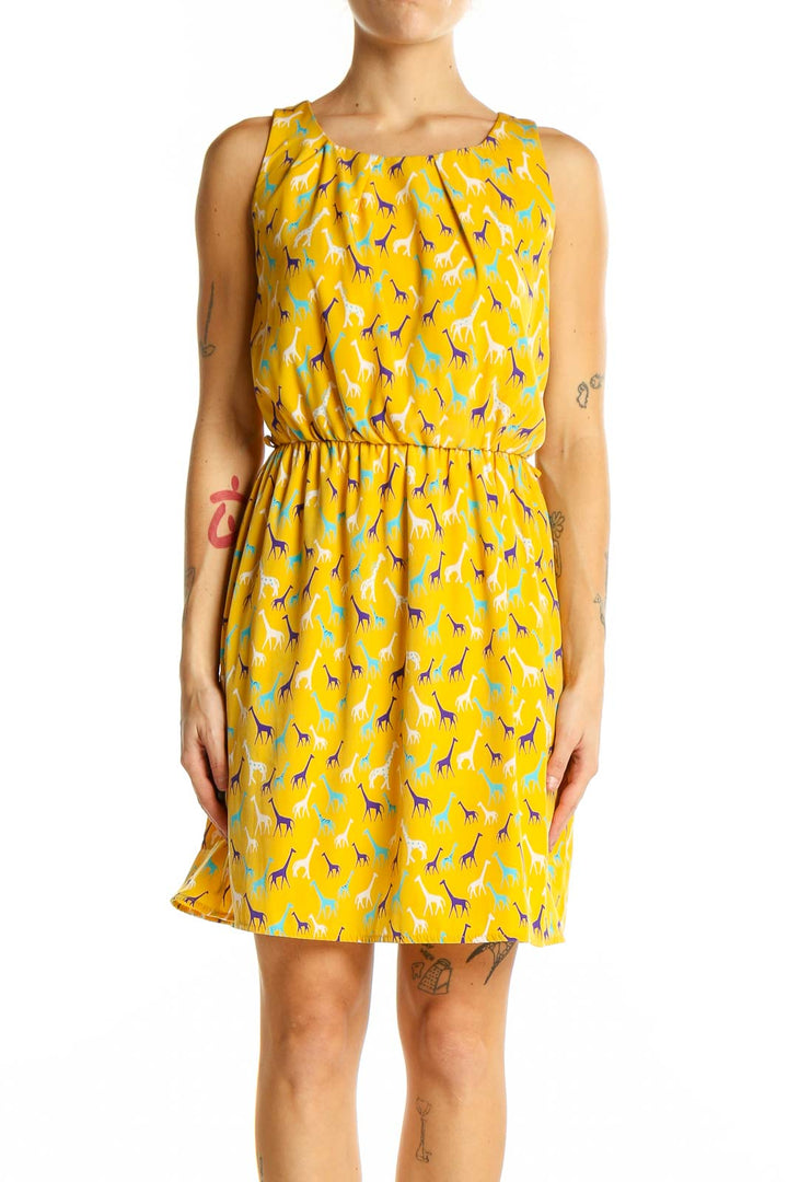 Front view of Yellow Giraffe Print Sleeveless Dress by Pink Owl
