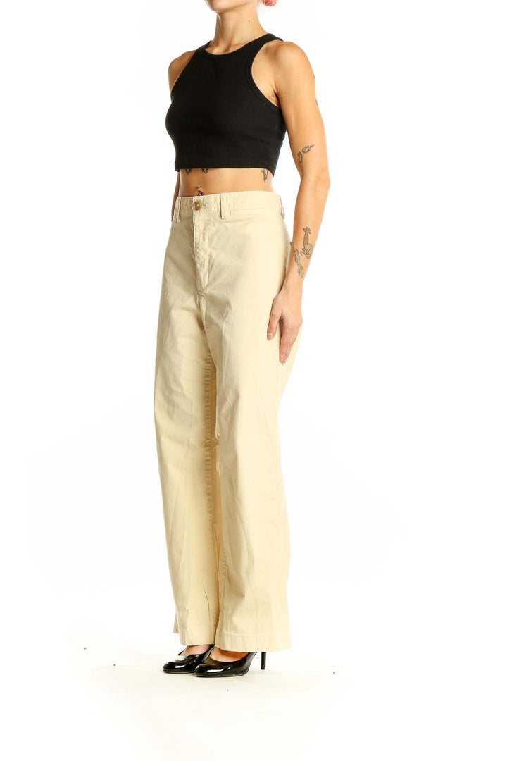 Front view of cream Gap wide-leg pants on model