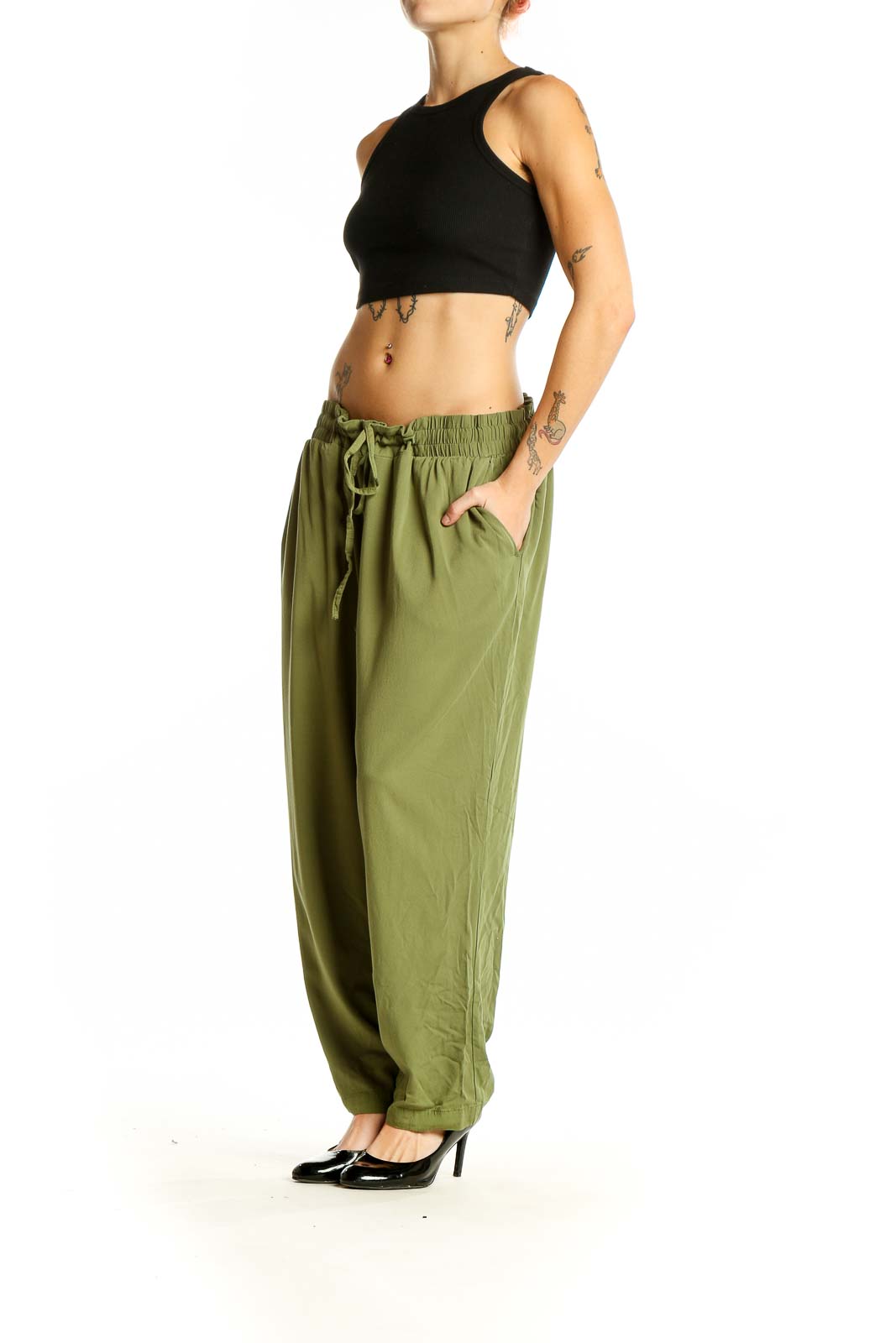Front view of olive green relaxed-fit drawstring pants from Torrid