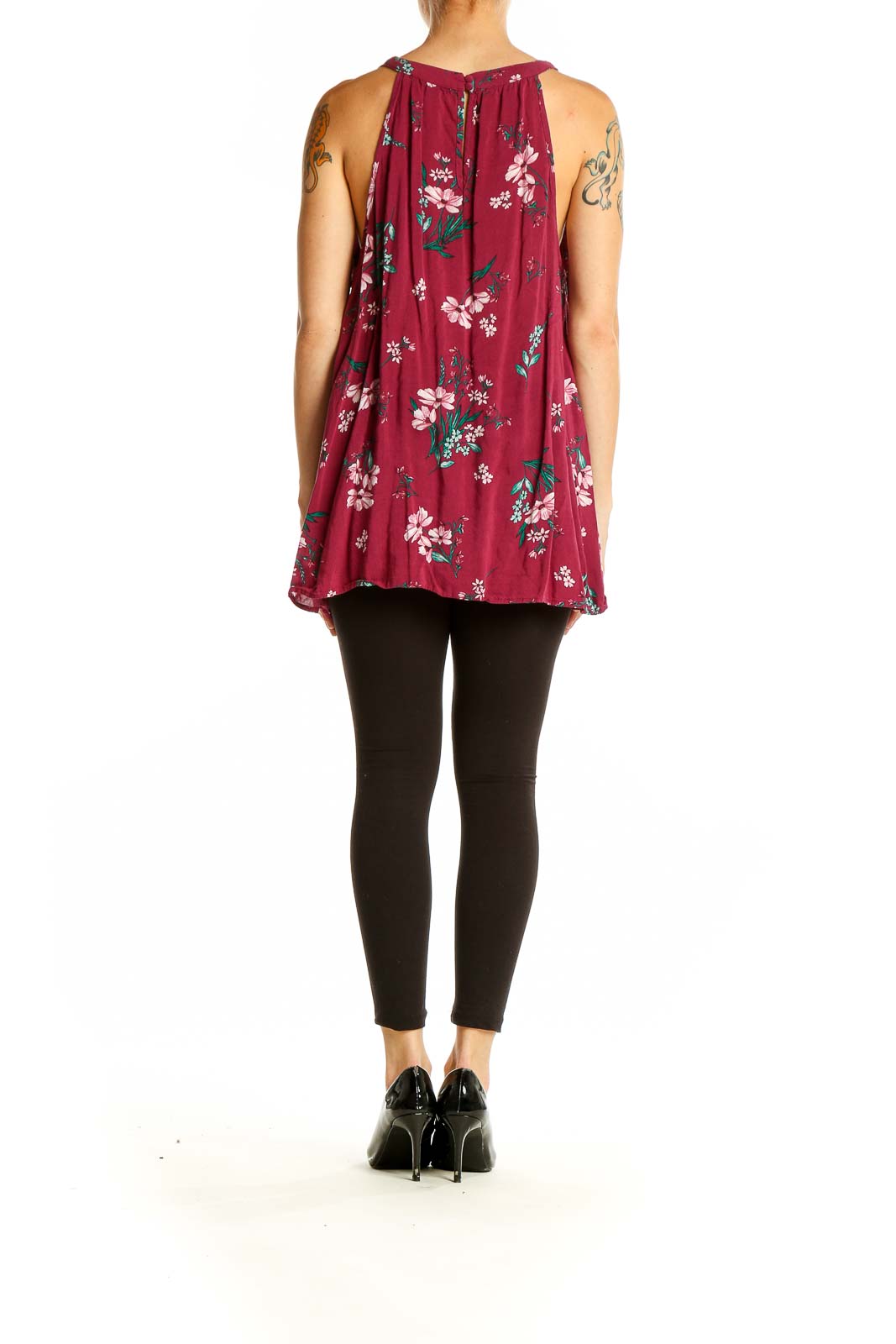 Side view of Torrid burgundy floral tank top showing flowy silhouette