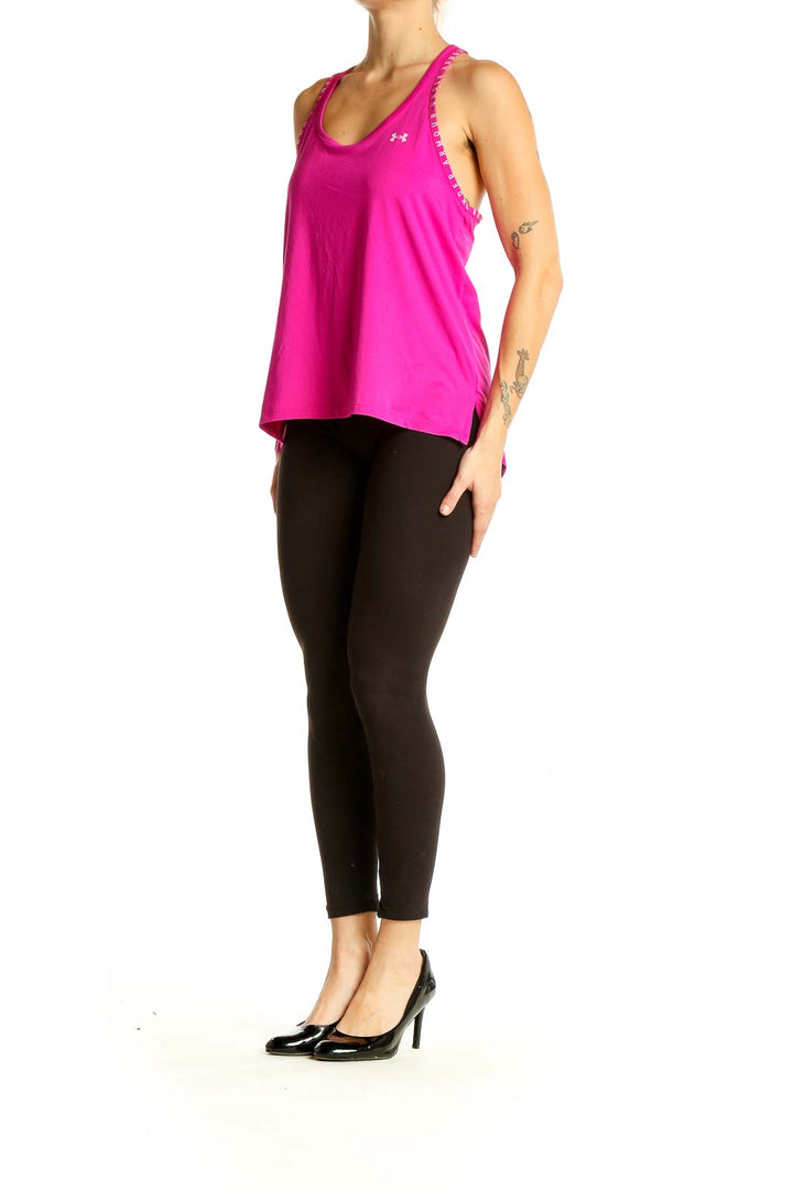Front view of pink Under Armour racerback tank top with contrasting trim