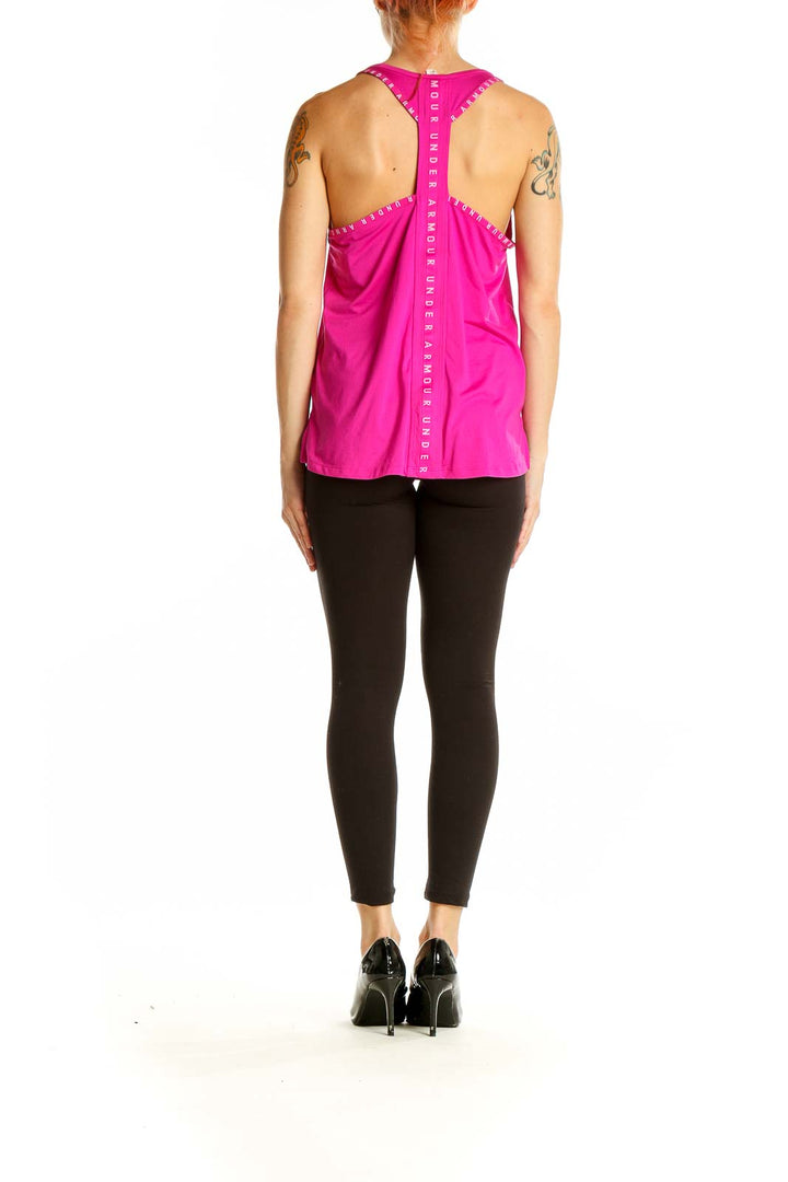 Back view of pink Under Armour racerback tank top showing longer hem and stylish design