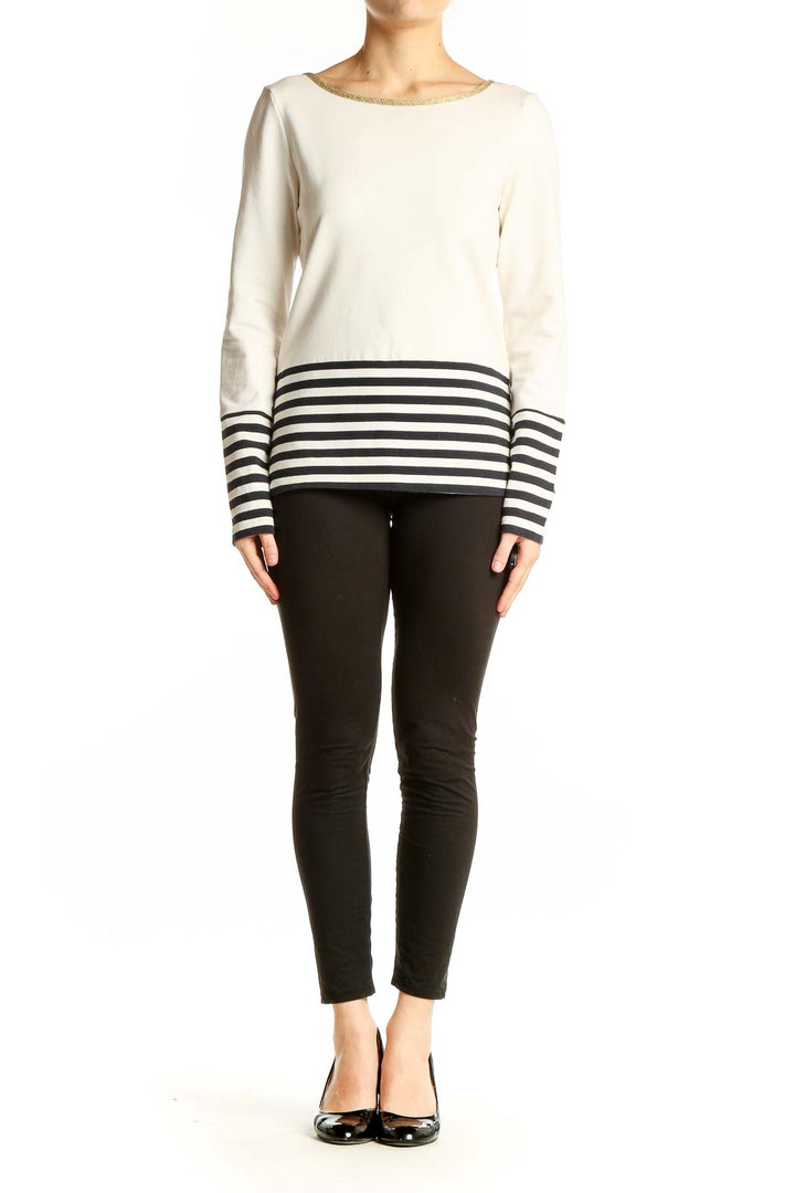 Front view of Banana Republic white top with black striped bottom
