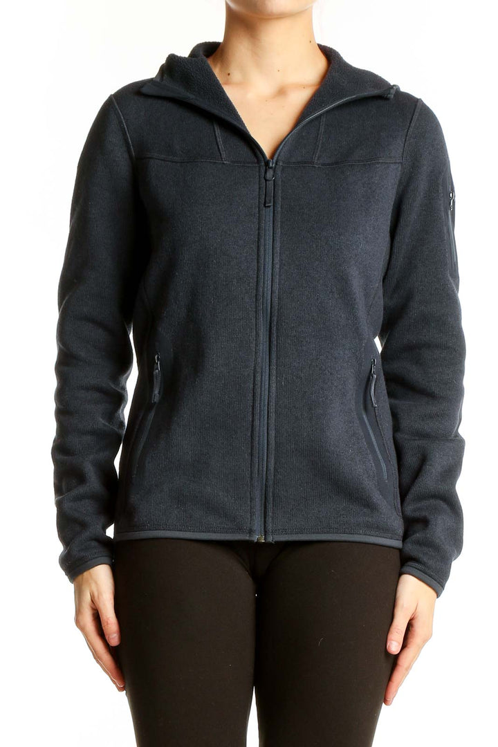 Front view of black Arc'teryx polyester fleece jacket with full-zip closure