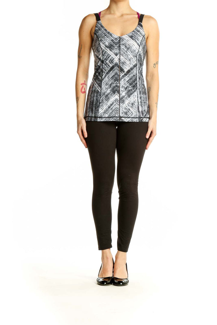 Front view of gray geometric print Lululemon athletic tank top with burgundy and black straps