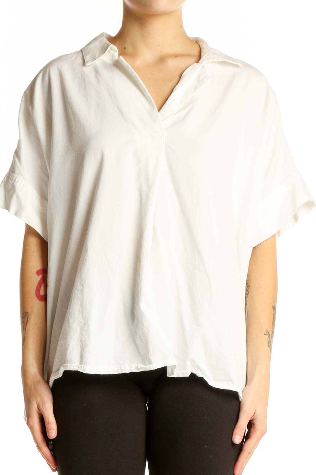 Front view of white oversized Madewell top with v-neck and short sleeves