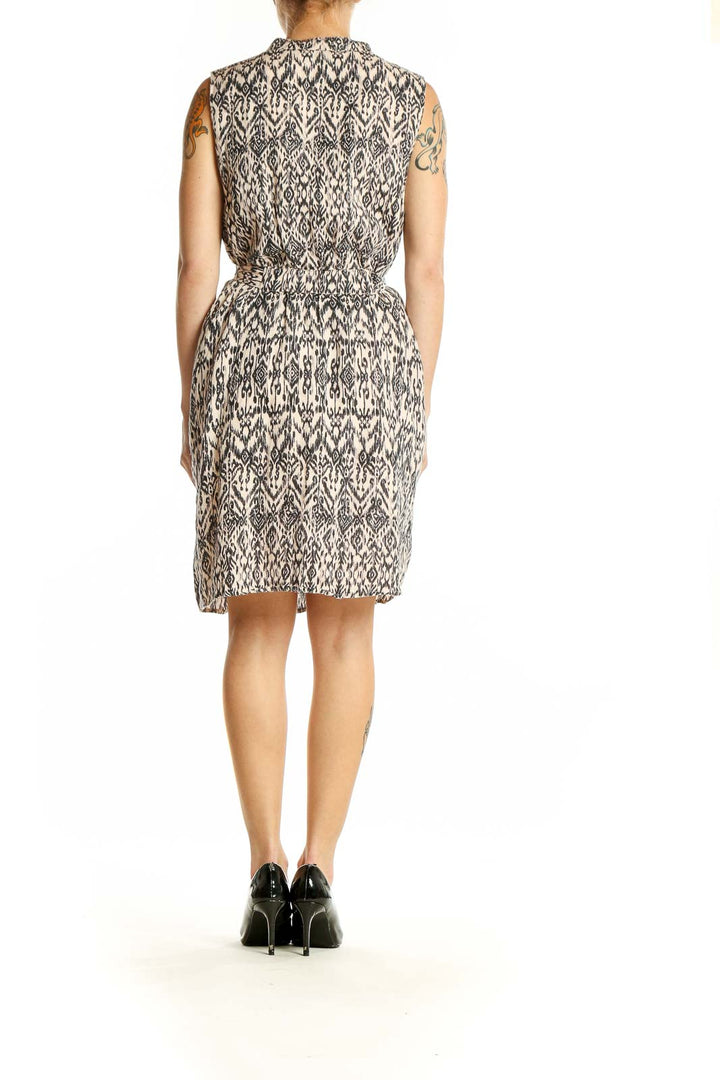 Side view of Cynthia Rowley black and white ikat print linen dress