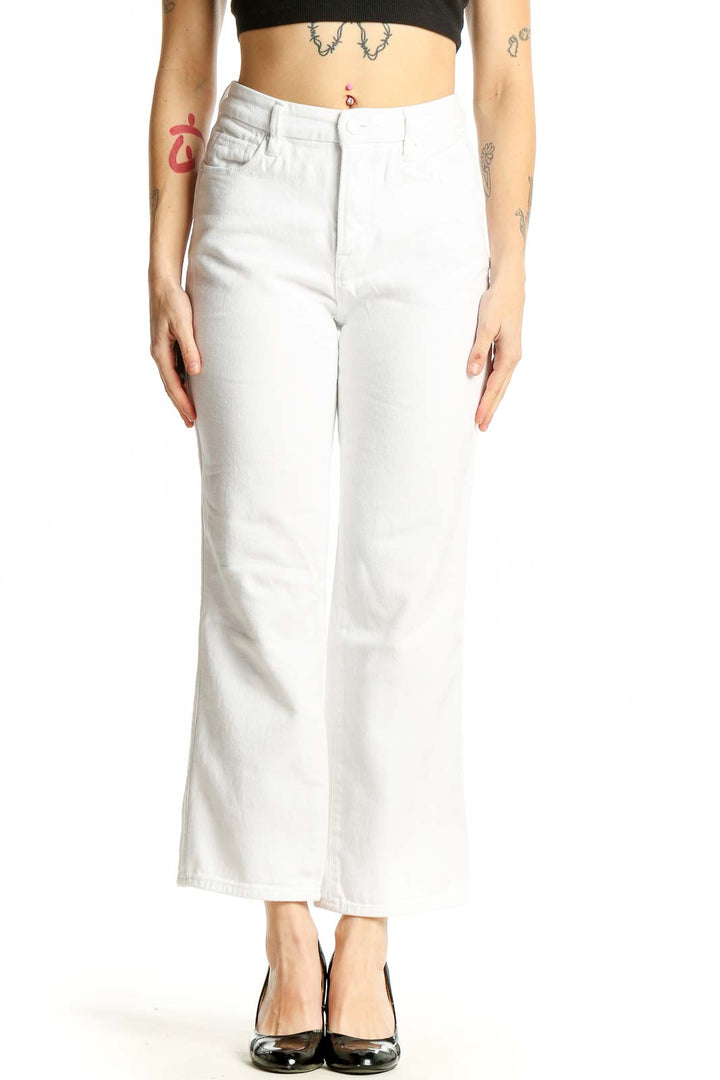 Front view of Good American white straight leg jeans on model