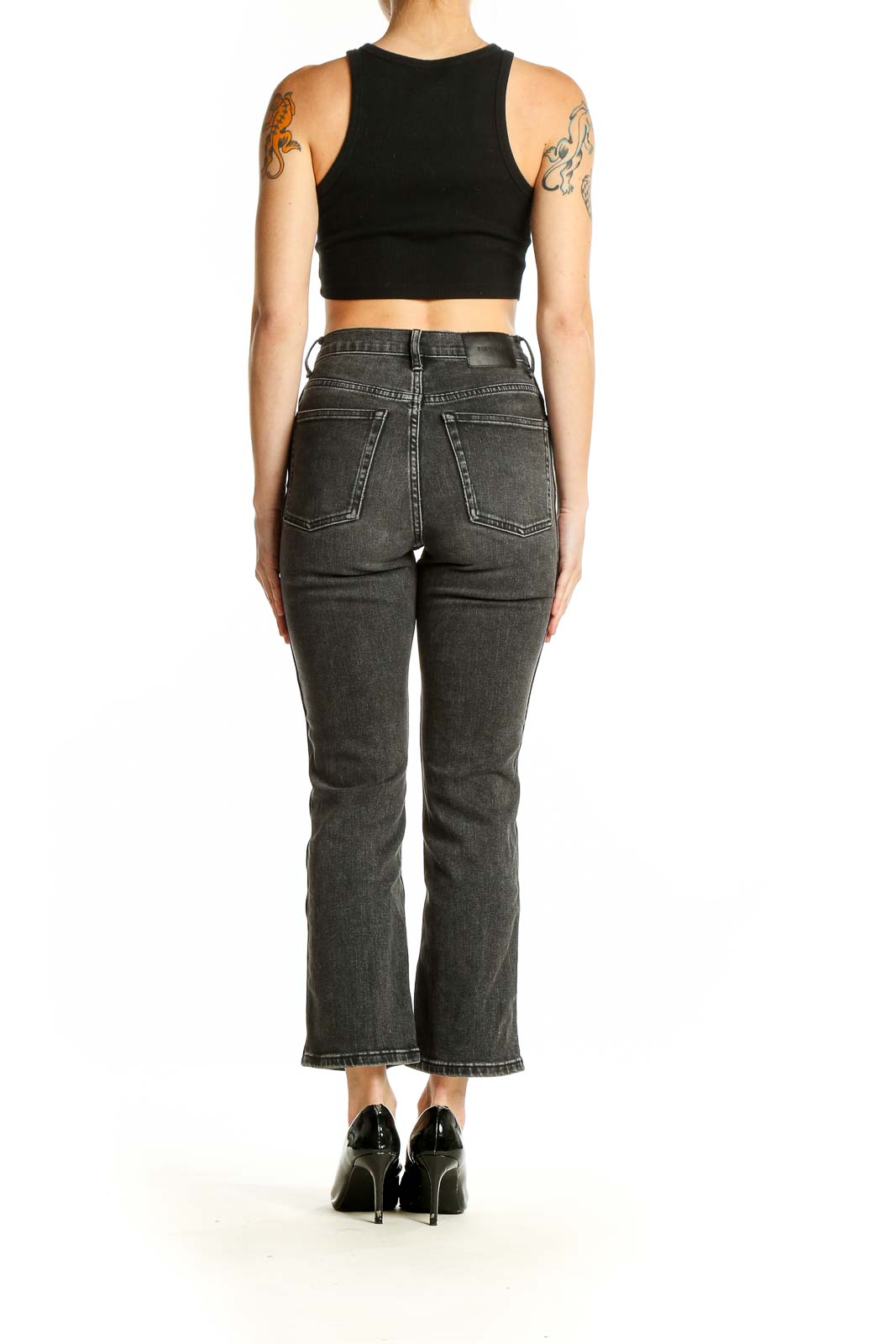 Back view of Everlane charcoal gray high-rise straight leg jeans on model