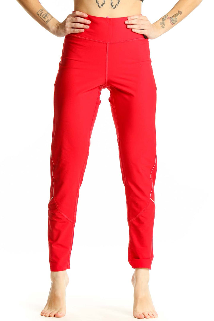 Front view of red Victoria Sport high-waisted performance leggings