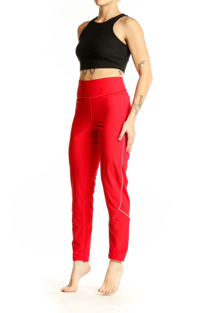 Front view of red Victoria Sport high-waisted performance leggings