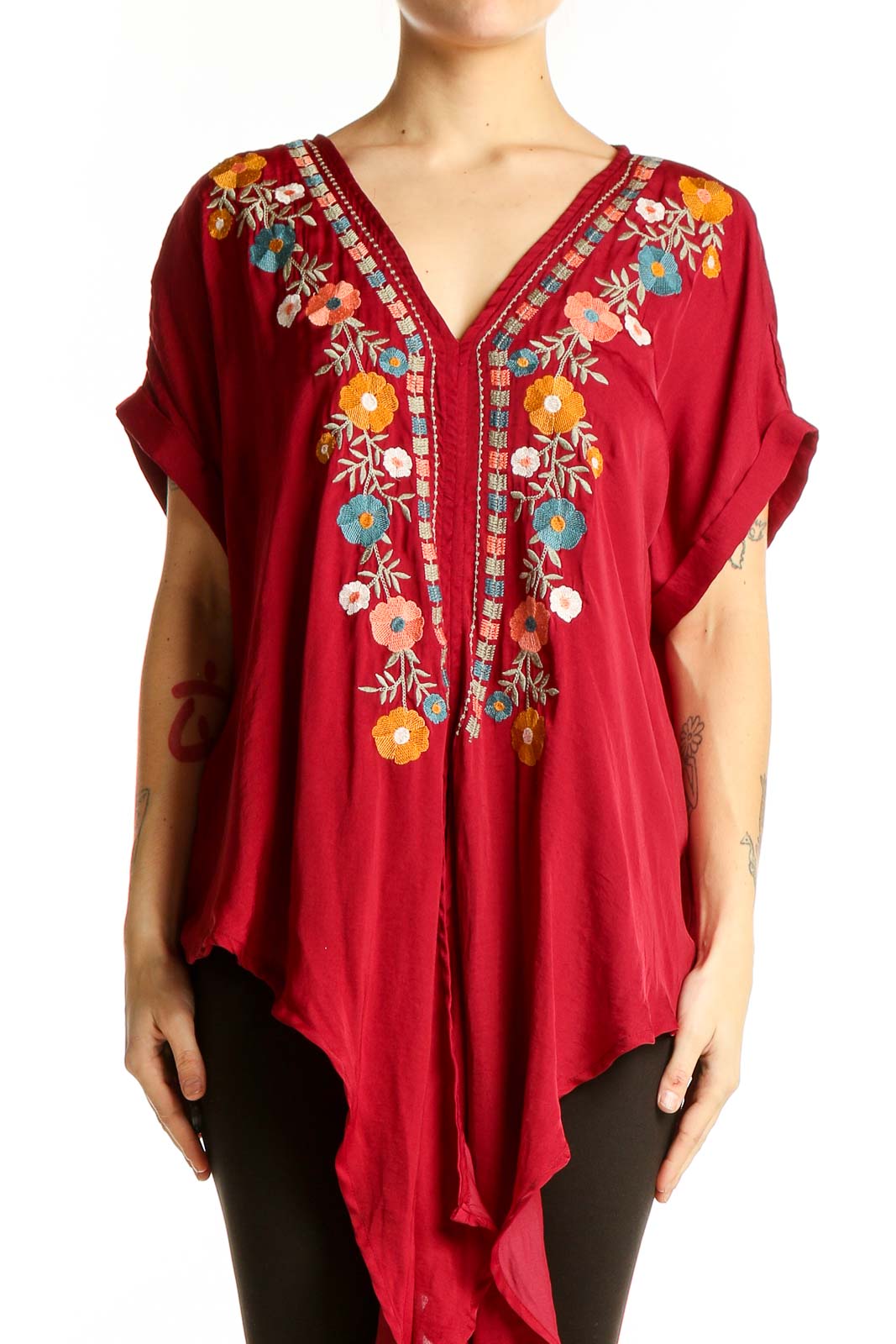 Front view of red Entro tunic top with colorful floral embroidery and V-neckline