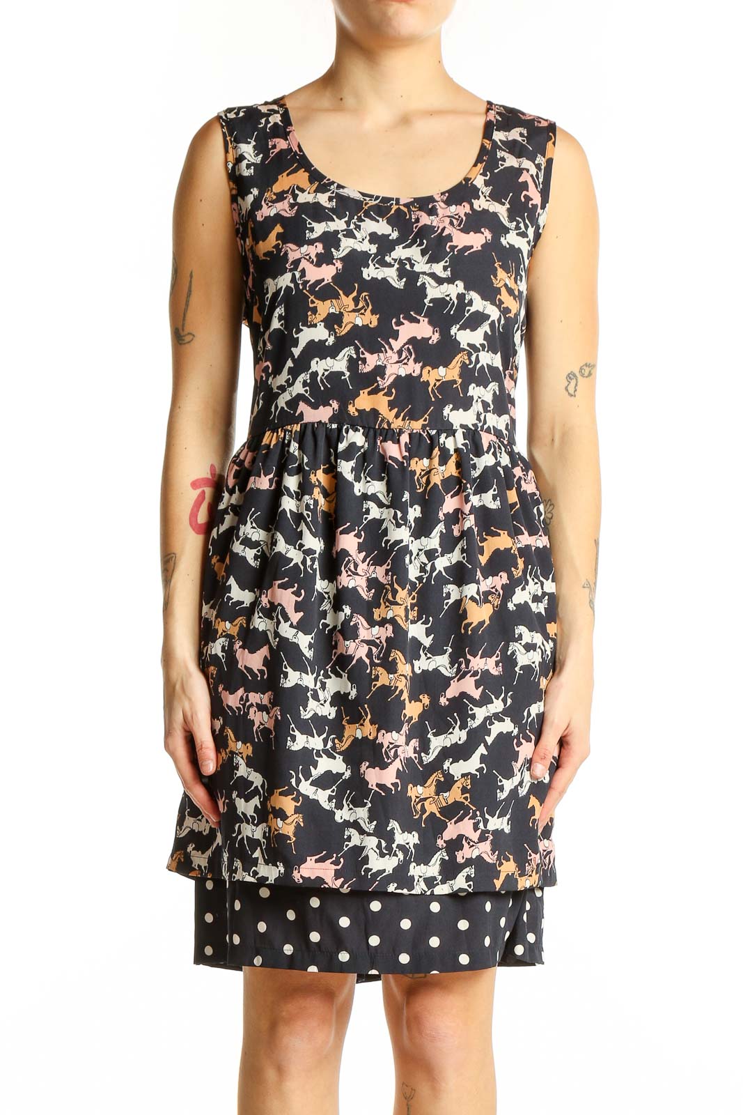 Front view of black Porridge dress with colorful horse print and polka dot hem